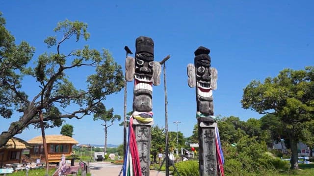 Traditional Totem Poles in front of Entrance Scenic Park