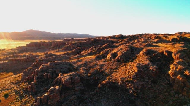 Golden Hour Over Rugged Desert Landscape