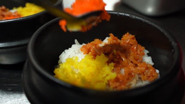 Savory Rice if Roe in a Black Earthen Pot