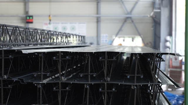 Stacked metal beams in a factory