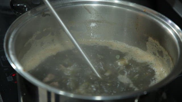 Laver soup being served in a bowl