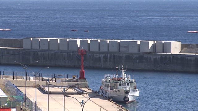 Fishing Boat Docked at a Quayside