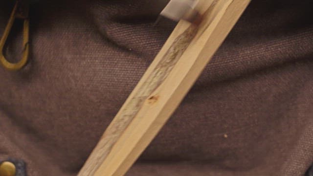 Carving wood with a sharp tool