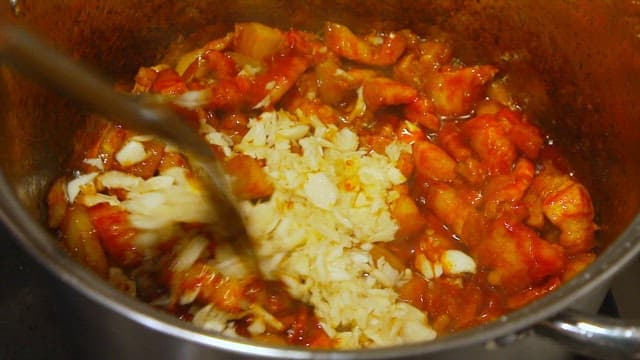 Cooking pork with gochujang in a pot