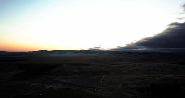 Mountain landscape at dawn with clouds