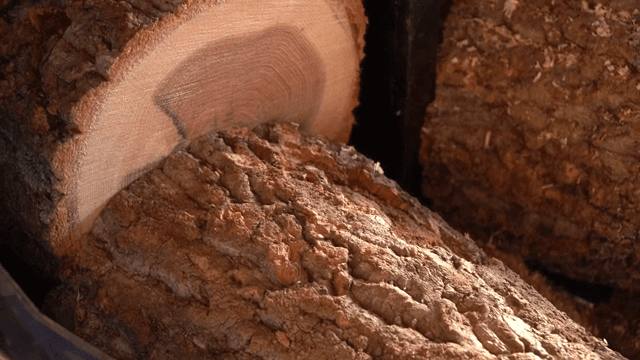 Wood being processed in a machine
