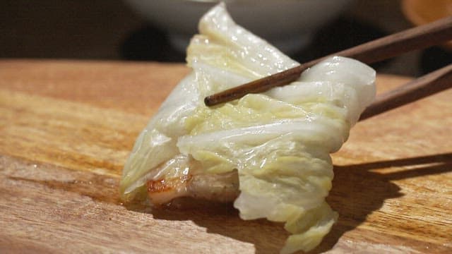 Appetizing meat served with fresh cabbage