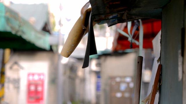 Orange awning swaying in the wind