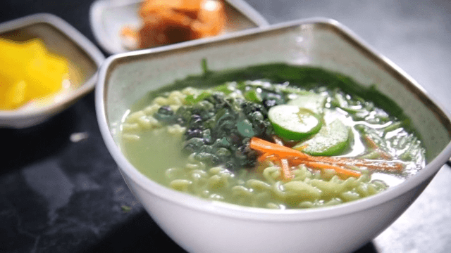 Warm marsh snail ramen plated with side dishes