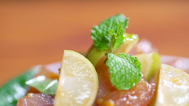 Fresh tuna sashimi with lemon and mint