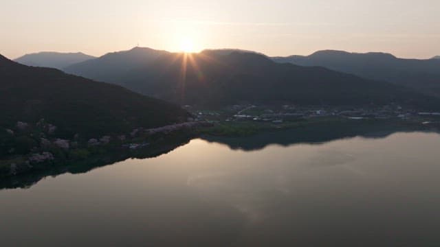 Sunrise over a tranquil mountain lake