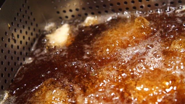 Deep frying food in hot oil