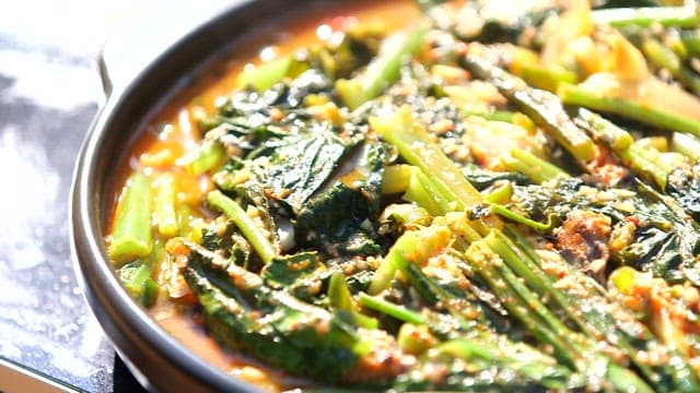 Warm and appetizing young radish and saury stew plated in a bowl