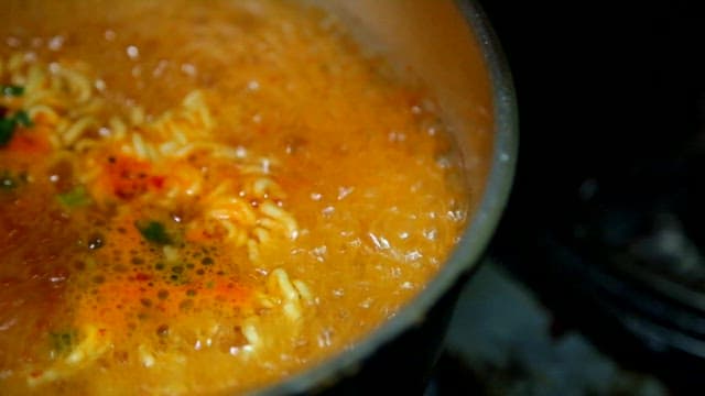 Ramyeon boiling in a pot