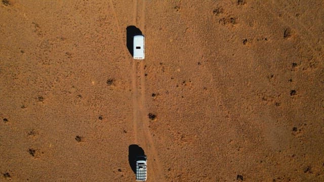 Vehicle Driving in a Barren and Vast Desert