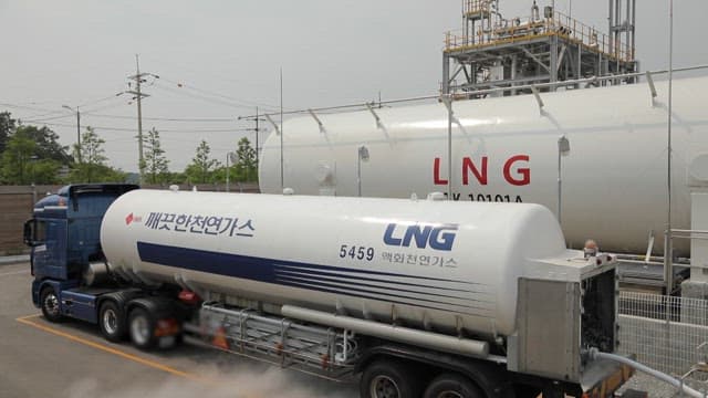 LNG truck refueling at an industrial gas station