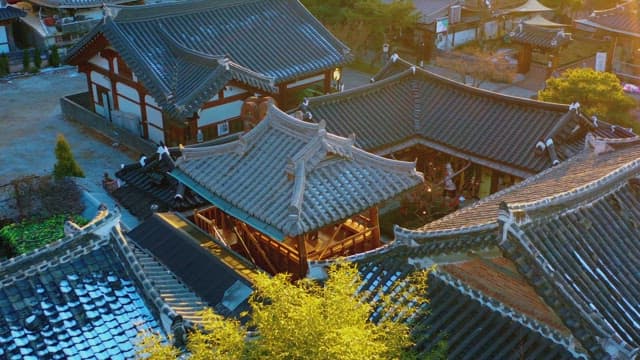Traditional Korean Village in City at Sunset