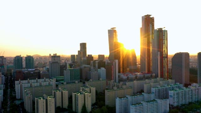 Cityscape at Dusk with Golden Sunlight