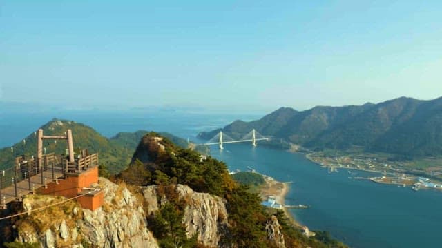 Panoramic View of a Mountainous Landscape with Bridge