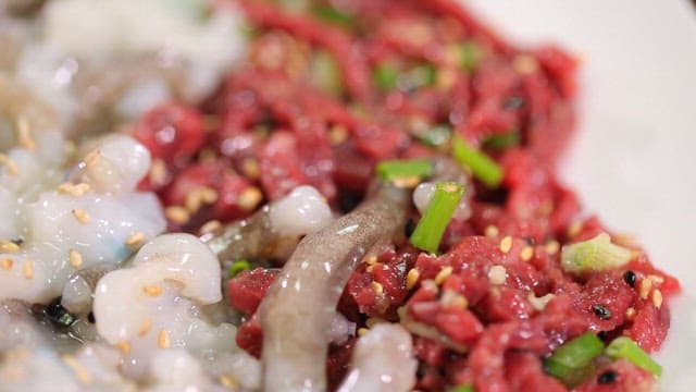 Fresh sliced octopus and beef tartare
