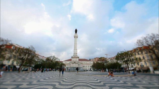 People Walking Around Historic Monument Square