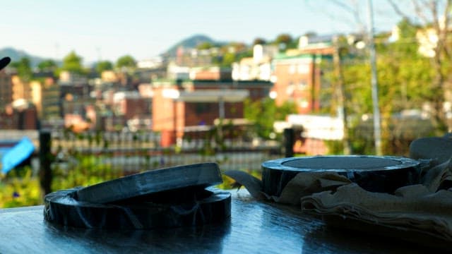 Panoramic view of the housing complex beyond the table