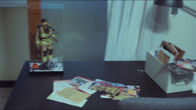 Moving Boxes Next to the Cluttered Desk