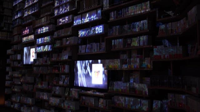 Bookshelf in a Library with Digital Images