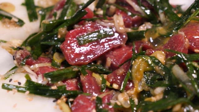 Beef Tartare Mixed with Fresh Vegetables on a Plate