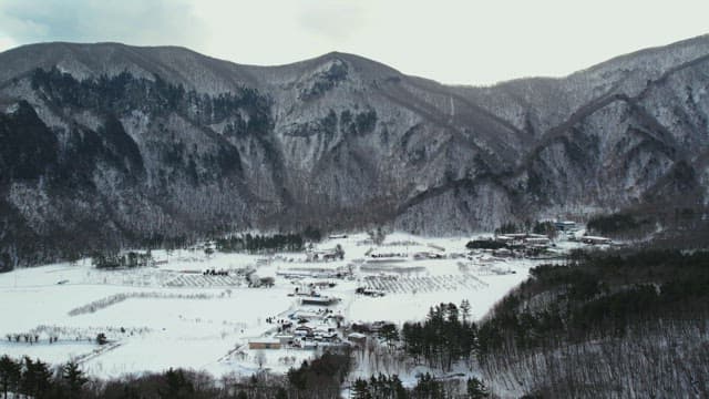 Snow-Covered Mountain Village in Winter