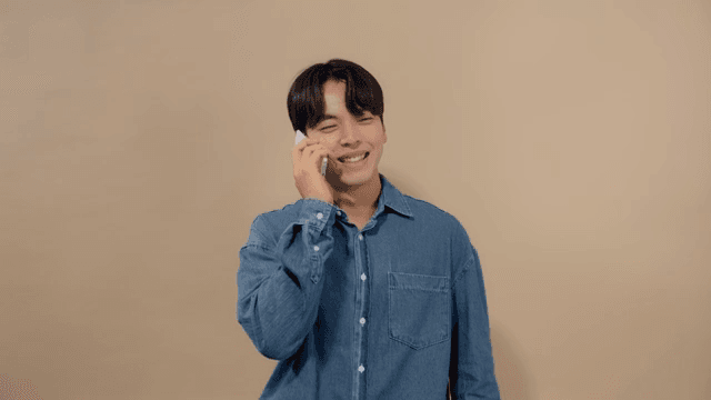 Front view of a man talking on the phone