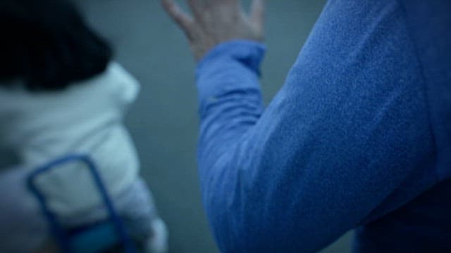 Child Learning to Ride a Bicycle with Parents