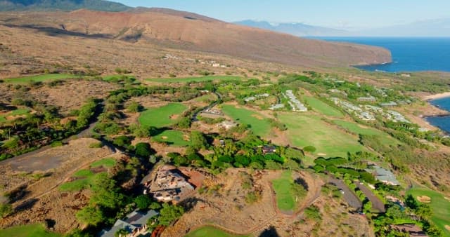 Golf course adjacent to the sea and surrounding nature
