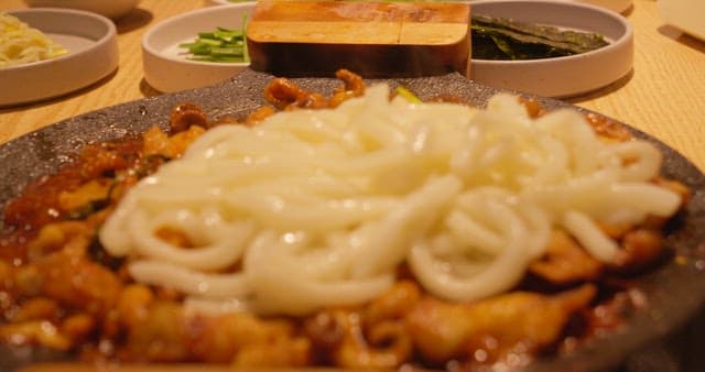 Udon Noodles Mixed Well with Stir-Fried Octopus