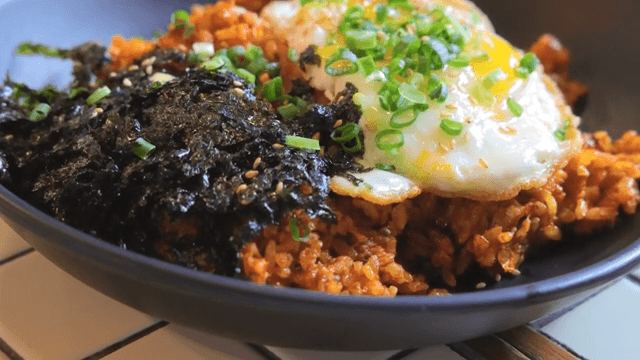 Kimchi fried rice Topped with Fried Egg and Dried Seaweed