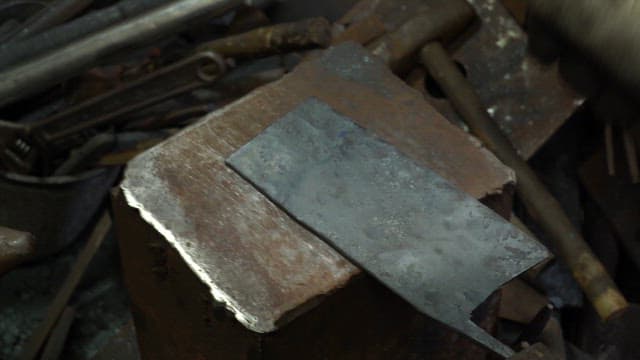Metal being forged on an anvil