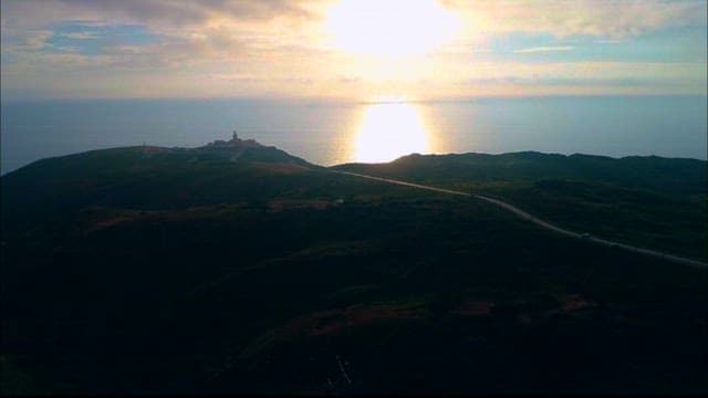 Serene Coastal Landscape with Lighthouse