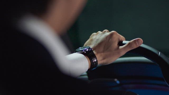 Man driving at night in the city