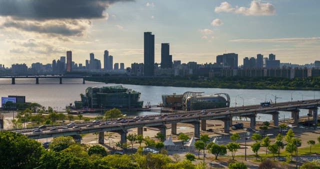 Panoramic view of the Han River and Seoul from daytime to night