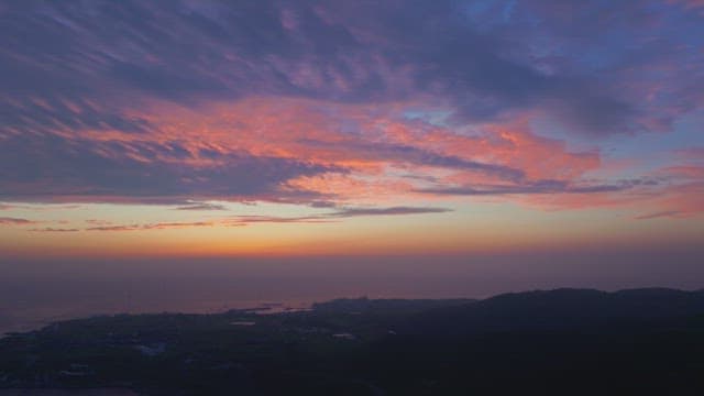 Colorful sunset over a coastal landscape