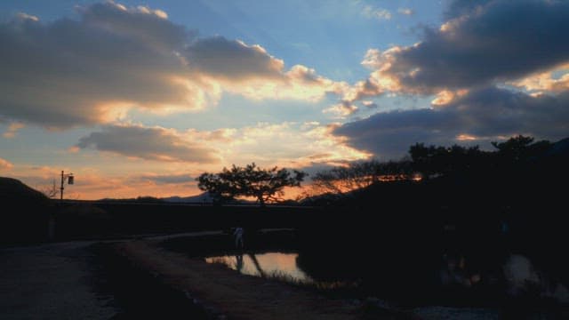 Beautiful countryside sunset and calm pond