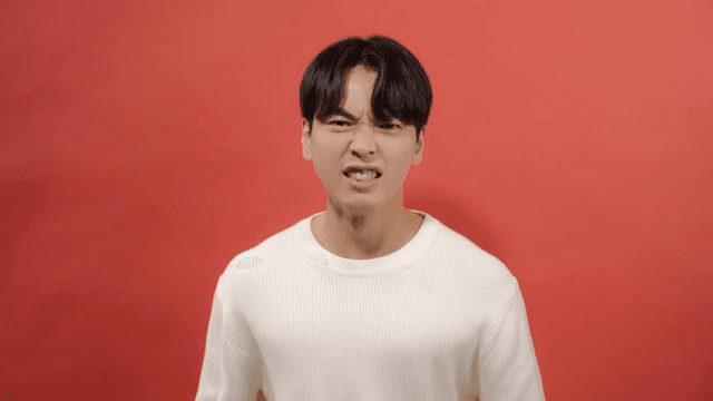 Man expressing strong anger with angry expression