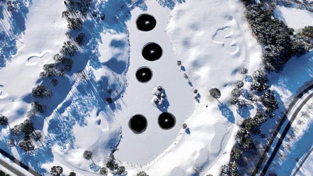 Snowy Landscape with Ponds