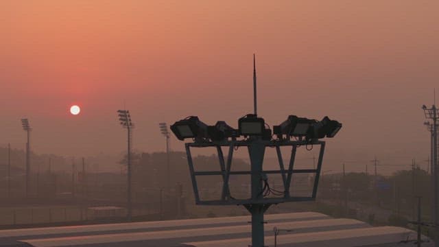 Baseball field at sunset with mist