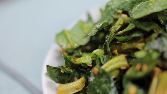 Fresh Korean spinach salad on a plate