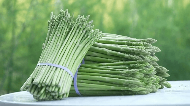 Fresh Asparagus Bunches on a Table