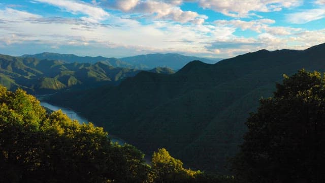 Aerial View of Majestic Mountains and River