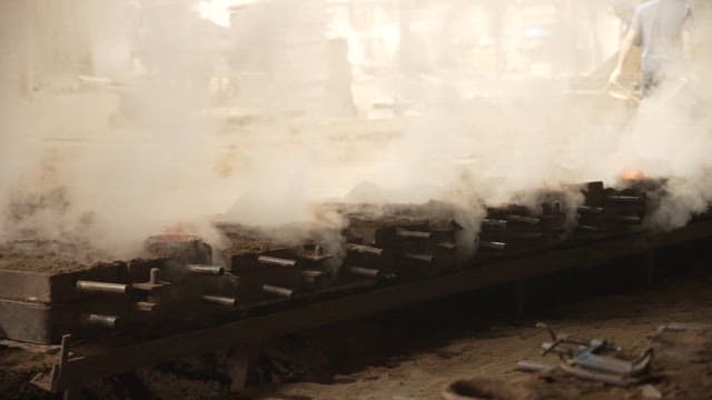 Smoke rising from industrial machinery