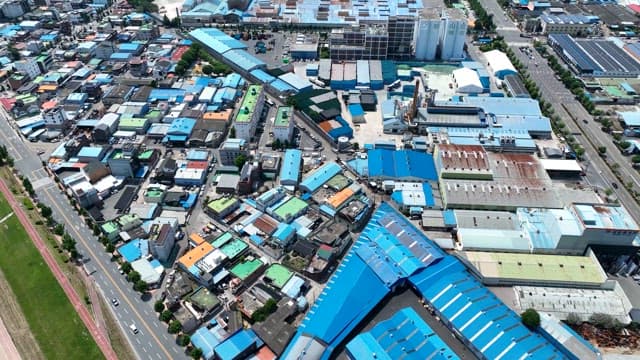 Sprawling industrial cityscape with factories