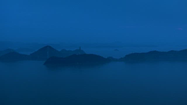 Serene Twilight Over Cloudy Mountains